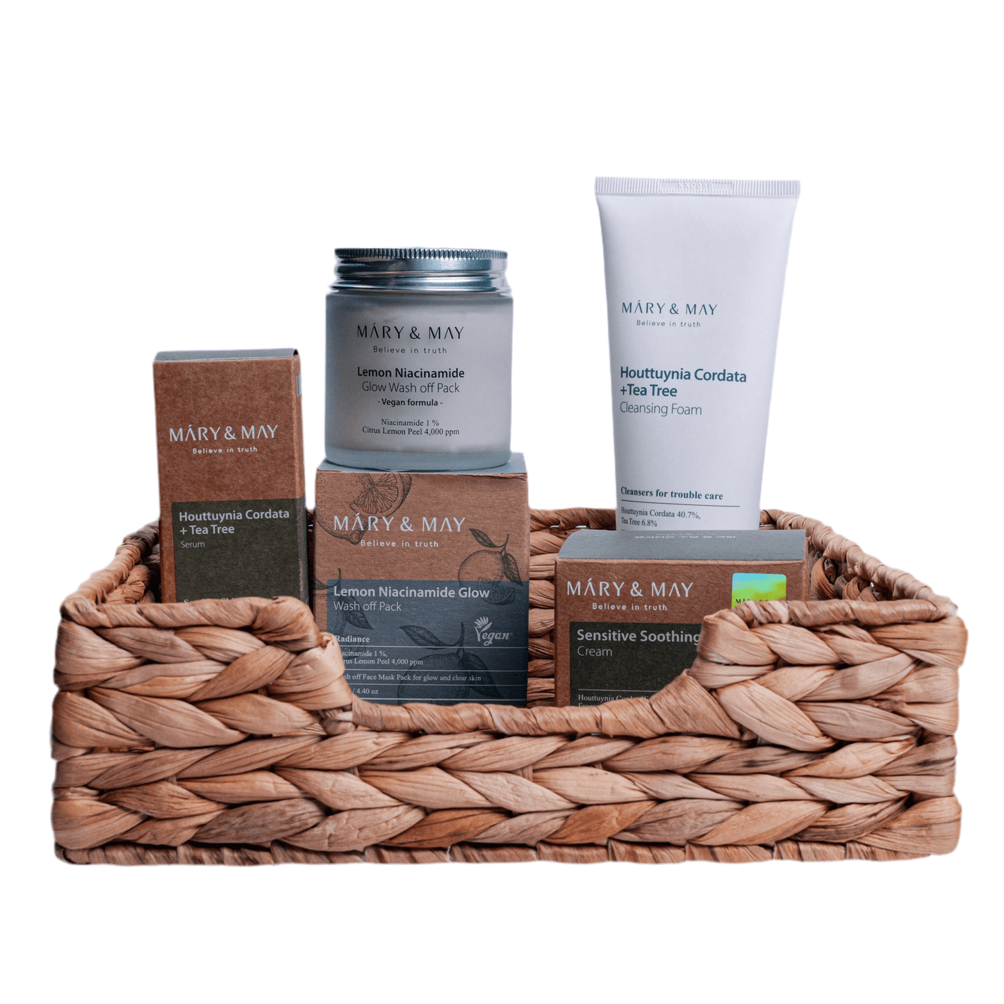 Acne Treatment Set 3 in a woven basket featuring cleansing foam and skincare products.