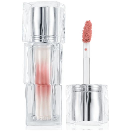 TIR TIR Hydrating & Glowlasting Waterism Glow Tint in clear packaging with applicator and pink hue.