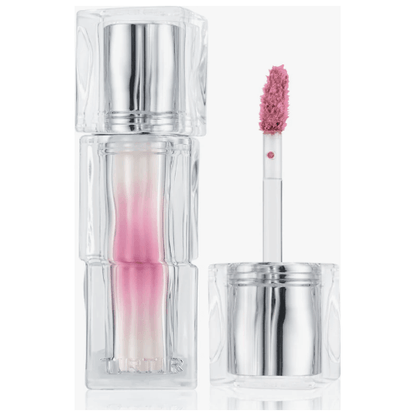 TIR TIR Hydrating & Glowlasting Waterism Glow Tint in a clear tube with applicator, delivering hydration and shine.