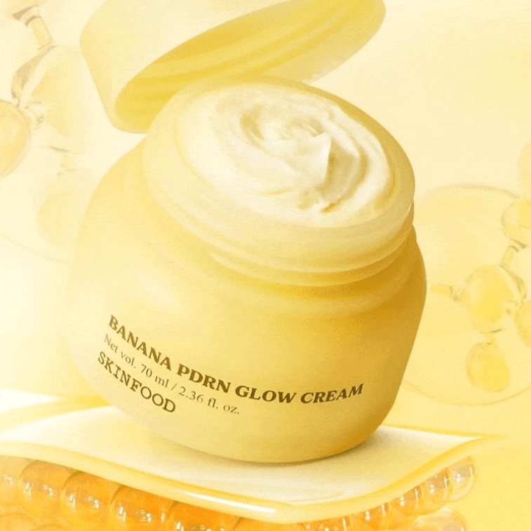 Skinfood Banana PDRN Glow Cream jar with a soft yellow cream, highlighting skin nourishment and hydration.