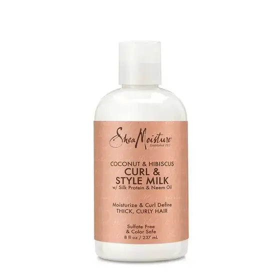 SheaMoisture Coconut & Hibiscus Curl & Style Milk for frizz-free, beautiful curls with organic ingredients.