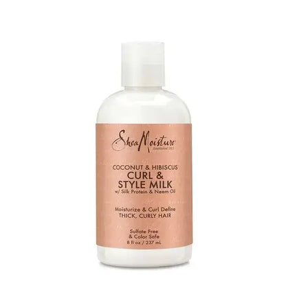 SheaMoisture Coconut & Hibiscus Curl & Style Milk for frizz-free, beautiful curls with organic ingredients.