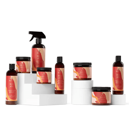 As I Am Jamaican Black Castor Oil Conditioner and its product collection displayed on white pedestals.