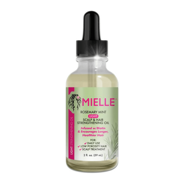Mielle Organics Rosemary Oil Hair Oil Light bottle for scalp and hair strengthening with rosemary and biotin.