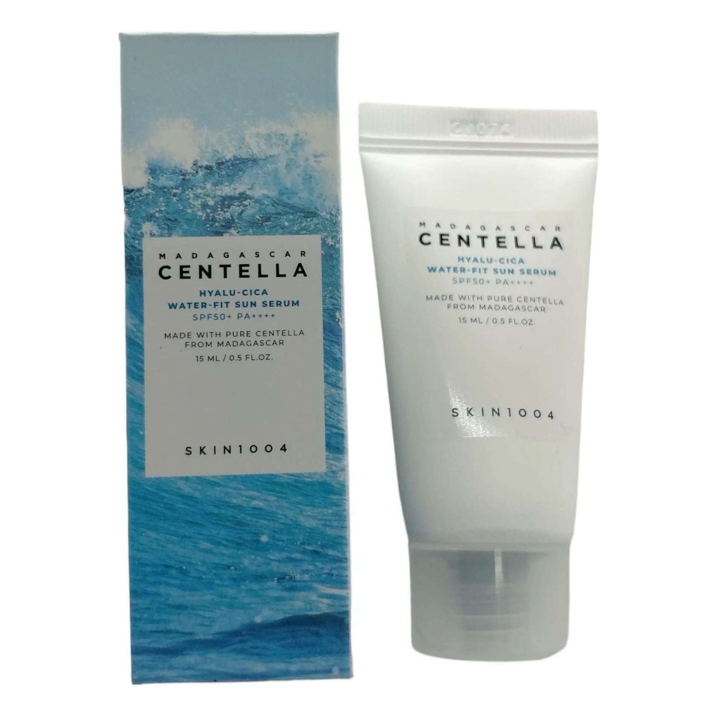 SKIN1004 Madagascar Centella Hyalu-Cica Water-Fit Sun Serum SPF50+ packaging and product tube against a blue background.