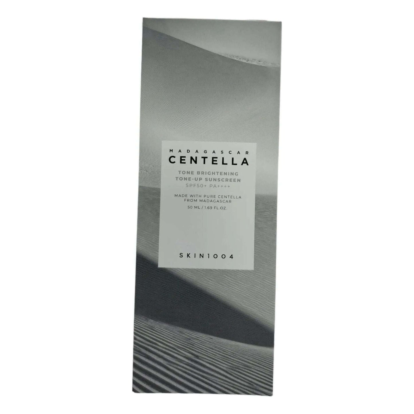 SKIN1004 Madagascar Centella Tone Brightening Tone-Up Sunscreen 50ml packaging with SPF 50+ protection details.
